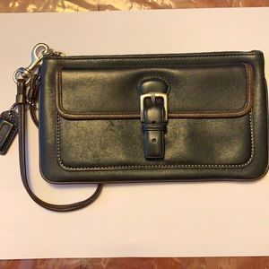 Coach black w/brown trim wristlet